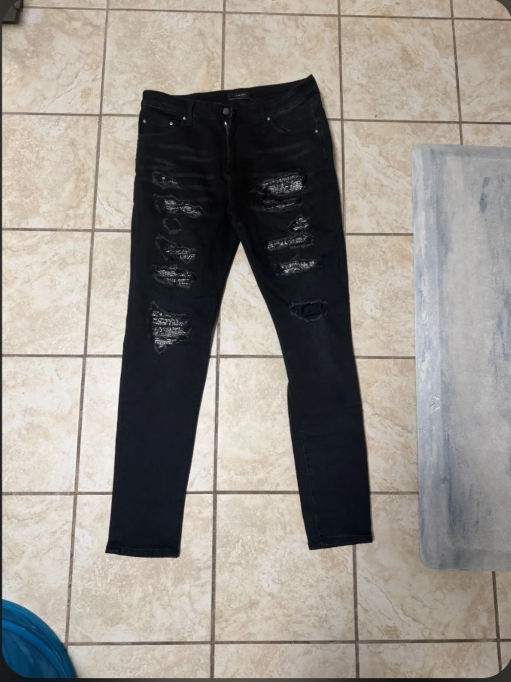AMIRI Black Distressed Skinny Jeans